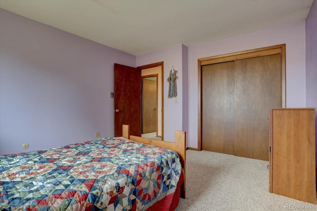 carpeted bedroom with a closet