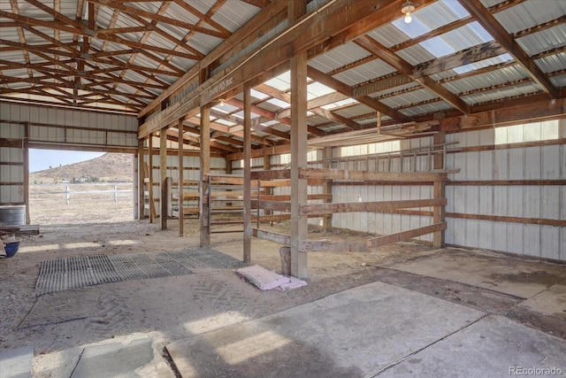 view of stable with a mountain view