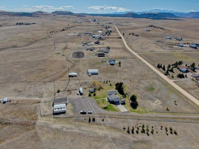 aerial view featuring a mountain view and a rural view