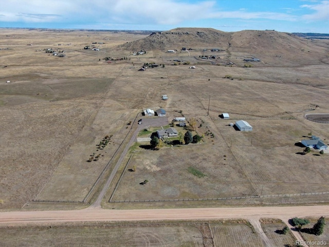 11810 Mesa View Rd, Larkspur, CO 80118 - aerial view of property's location featuring rural landscape and a mountain backdrop