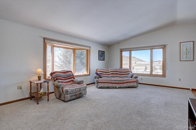 11810 Mesa View Rd, Larkspur, CO 80118 - carpeted living area with vaulted ceiling and baseboards