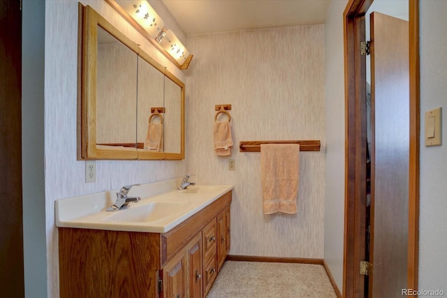 11810 Mesa View Rd, Larkspur, CO 80118 - full bathroom with wallpapered walls, double vanity, and baseboards