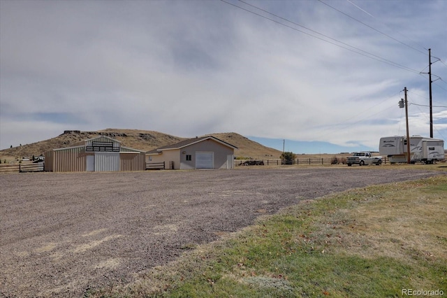 11810 Mesa View Rd, Larkspur, CO 80118 - view of front of house with an outbuilding