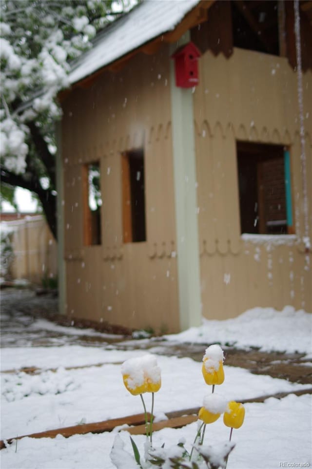 view of snow covered property