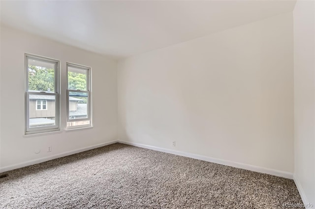 8759 E Roundtree Ave, Greenwood Village, CO 80111 - unfurnished room featuring carpet flooring and baseboards