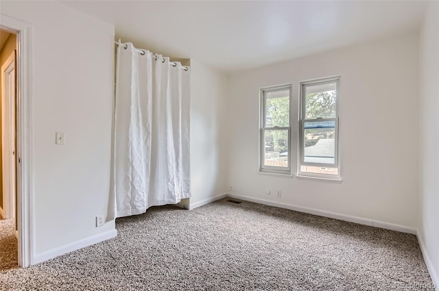 8759 E Roundtree Ave, Greenwood Village, CO 80111 - unfurnished room featuring carpet and baseboards