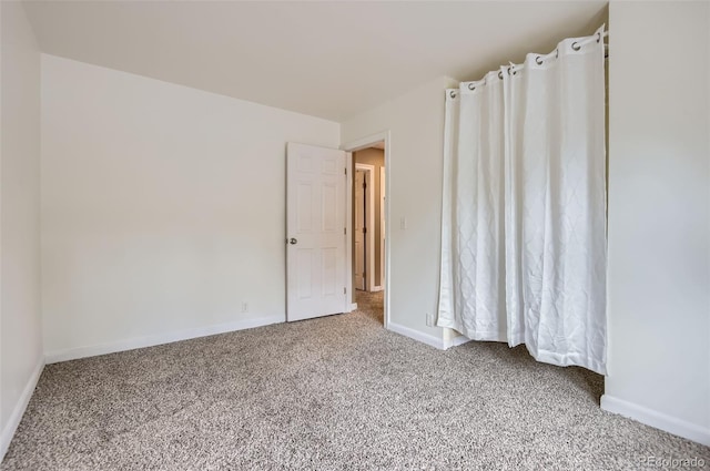 8759 E Roundtree Ave, Greenwood Village, CO 80111 - carpeted spare room with baseboards