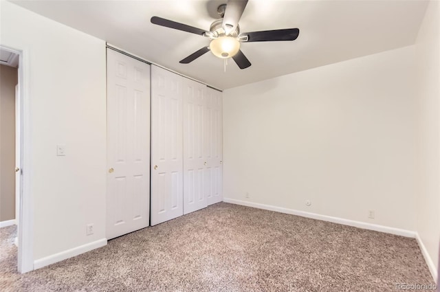 8759 E Roundtree Ave, Greenwood Village, CO 80111 - unfurnished bedroom with carpet floors, a closet, and ceiling fan
