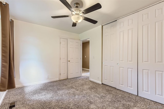 8759 E Roundtree Ave, Greenwood Village, CO 80111 - unfurnished bedroom featuring carpet, a closet, and a ceiling fan