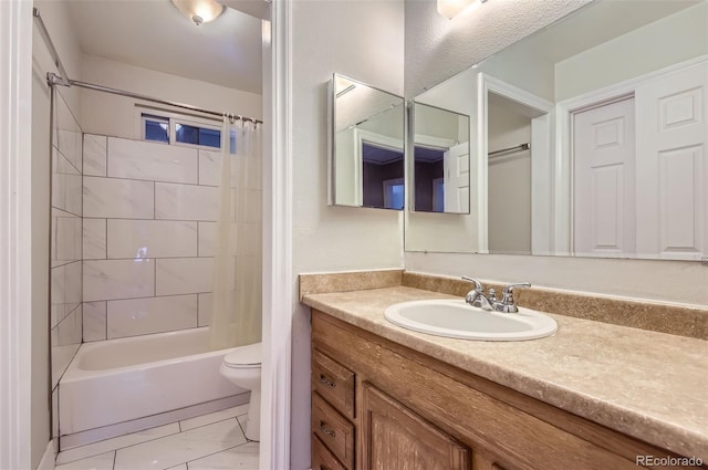 8759 E Roundtree Ave, Greenwood Village, CO 80111 - bathroom featuring vanity, shower / bath combo, and tile patterned flooring