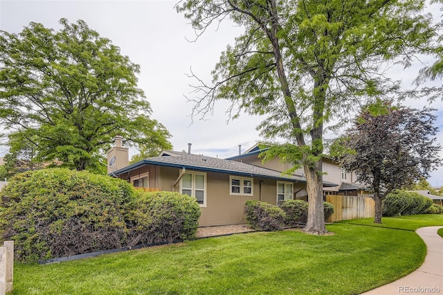 8759 E Roundtree Ave, Greenwood Village, CO 80111 - view of property exterior featuring a chimney