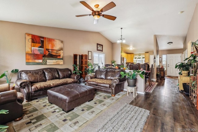 4759 Mt Princeton, Brighton, CO 80601 - living room featuring ceiling fan, vaulted ceiling, and dark wood-style flooring