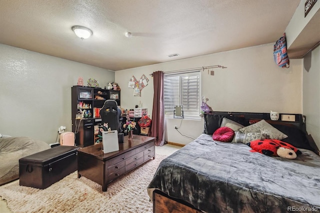 4759 Mt Princeton, Brighton, CO 80601 - bedroom featuring light colored carpet and a textured ceiling