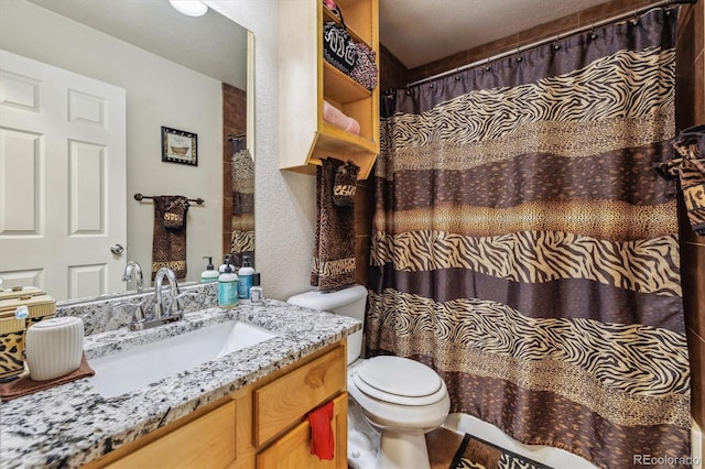 4759 Mt Princeton, Brighton, CO 80601 - full bathroom featuring toilet, vanity, and curtained shower