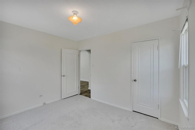 4480 S Pennsylvania St, Englewood, CO 80113 - unfurnished bedroom featuring carpet flooring and baseboards
