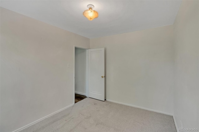 4480 S Pennsylvania St, Englewood, CO 80113 - carpeted empty room with baseboards