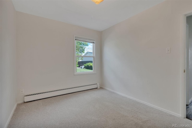 4480 S Pennsylvania St, Englewood, CO 80113 - spare room with a baseboard heating unit and carpet floors