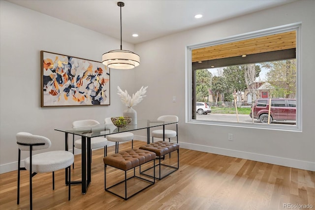 1423 Xavier St, Denver, CO 80204 - dining space with baseboards, light wood-style floors, and recessed lighting
