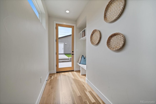 1423 Xavier St, Denver, CO 80204 - hall with baseboards and light wood-style flooring