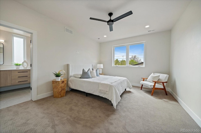 1423 Xavier St, Denver, CO 80204 - bedroom with light carpet, baseboards, a ceiling fan, connected bathroom, and recessed lighting