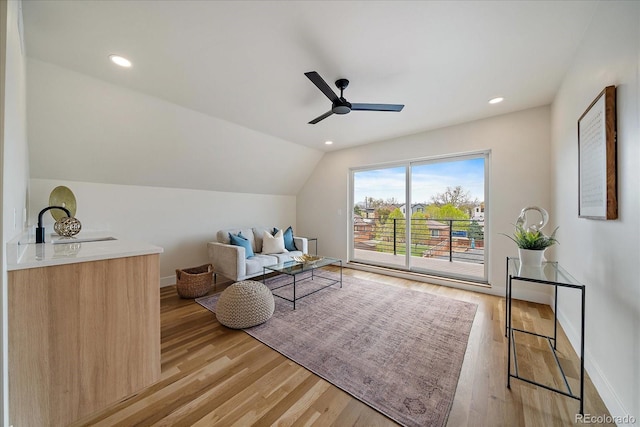 1423 Xavier St, Denver, CO 80204 - living area with a ceiling fan, light wood-style floors, baseboards, lofted ceiling, and recessed lighting