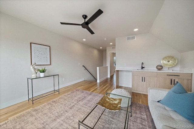 1423 Xavier St, Denver, CO 80204 - living room with light wood-style floors, ceiling fan, recessed lighting, and lofted ceiling