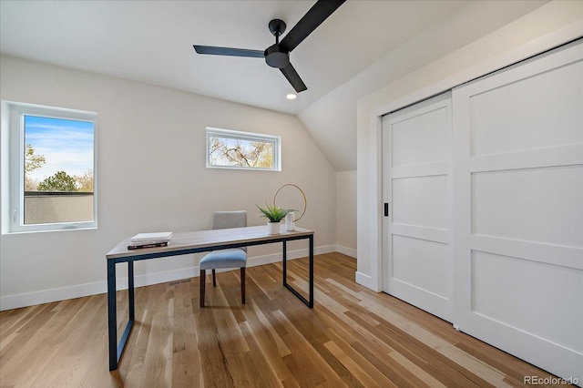 1423 Xavier St, Denver, CO 80204 - office area featuring ceiling fan, baseboards, vaulted ceiling, and light wood-style floors