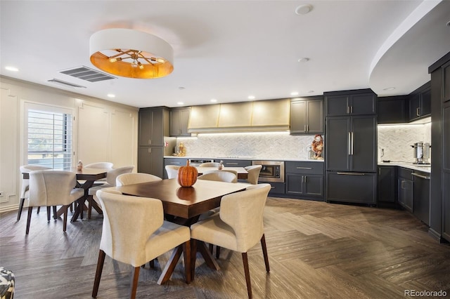 dining space featuring visible vents and recessed lighting