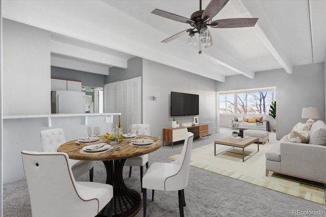 carpeted dining area featuring ceiling fan and beam ceiling