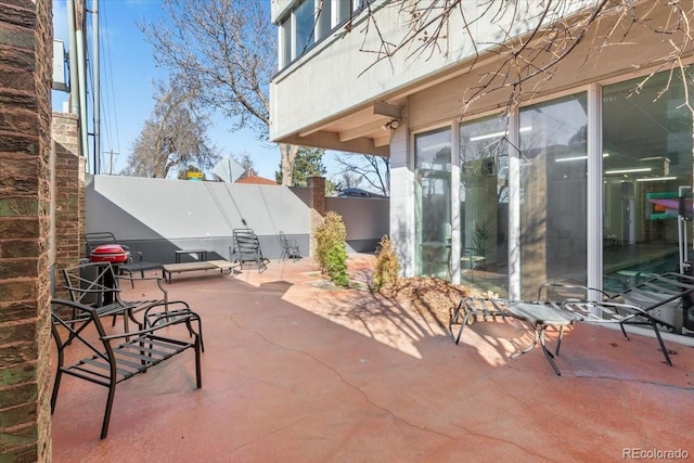 view of patio / terrace with fence