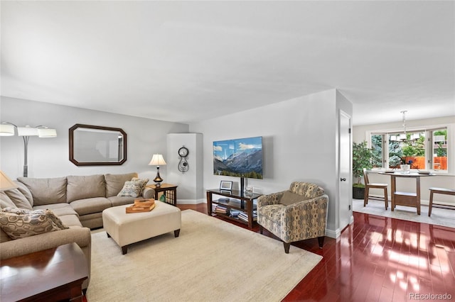 6504 W 85th Ave, Arvada, CO 80003 - living room featuring dark wood finished floors and baseboards