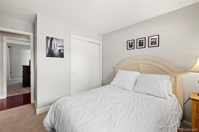 6504 W 85th Ave, Arvada, CO 80003 - carpeted bedroom with a closet and baseboards