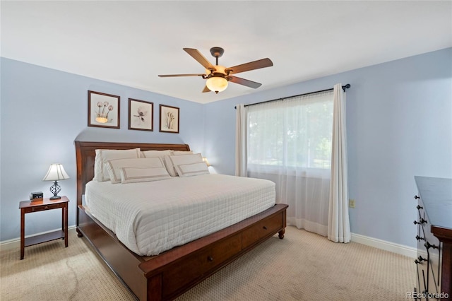 6504 W 85th Ave, Arvada, CO 80003 - bedroom with light colored carpet and a ceiling fan