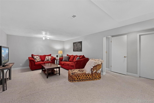 6504 W 85th Ave, Arvada, CO 80003 - carpeted living room featuring baseboards