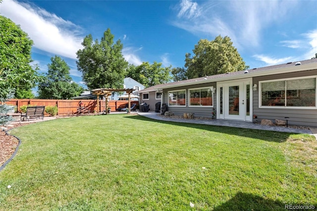 6504 W 85th Ave, Arvada, CO 80003 - view of yard featuring a patio area