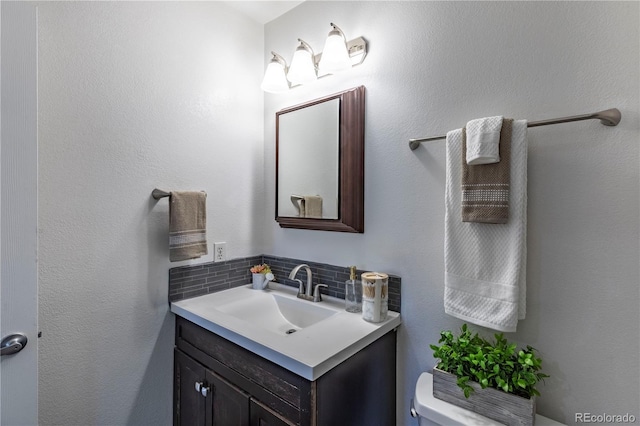 8800 W Kentucky Ave, Lakewood, CO 80226 - bathroom featuring vanity and toilet