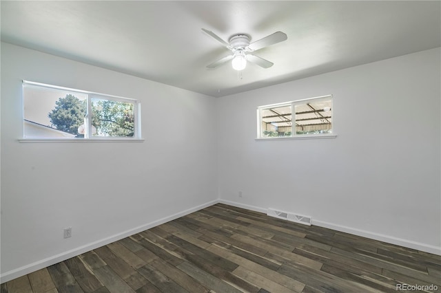 8800 W Kentucky Ave, Lakewood, CO 80226 - spare room featuring dark wood finished floors, a ceiling fan, and baseboards