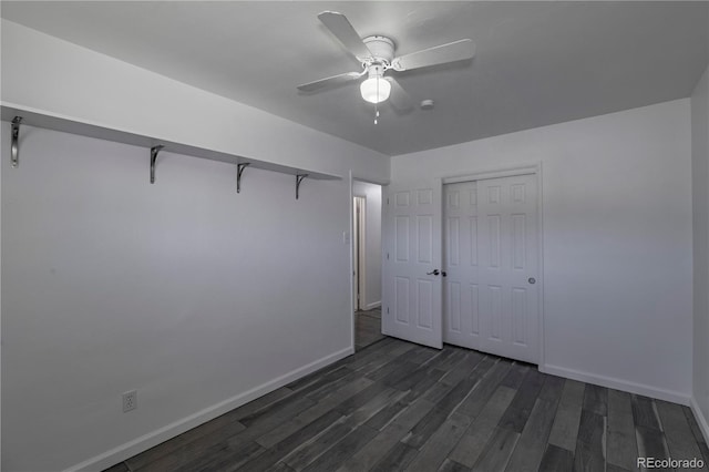 8800 W Kentucky Ave, Lakewood, CO 80226 - unfurnished bedroom featuring baseboards, dark wood-style floors, a closet, and ceiling fan