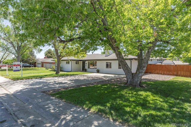 8800 W Kentucky Ave, Lakewood, CO 80226 - ranch-style home featuring driveway
