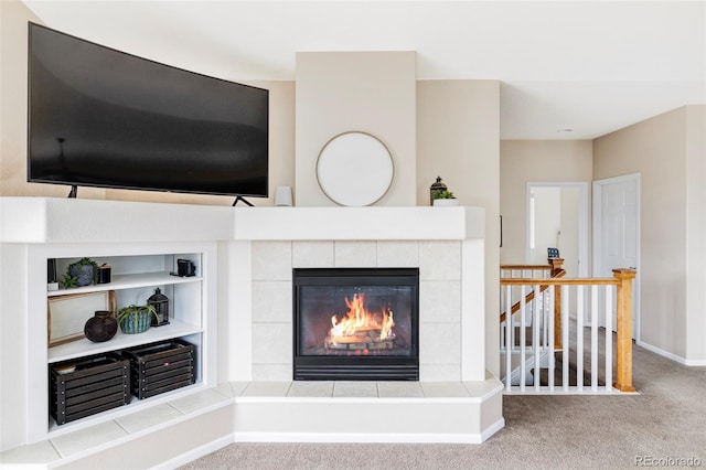 3972 S Shawnee Way, Aurora, CO 80018 - detailed view of carpet floors, a tile fireplace, and baseboards