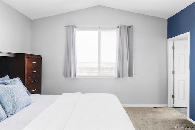 3972 S Shawnee Way, Aurora, CO 80018 - bedroom with carpet floors, lofted ceiling, and baseboards