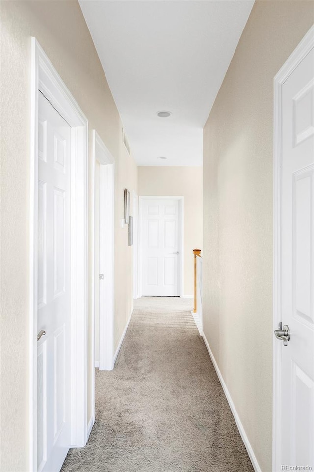 3972 S Shawnee Way, Aurora, CO 80018 - corridor featuring carpet flooring and baseboards