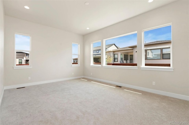 1711 Branching Canopy Dr, Windsor, CO 80550 - carpeted spare room with baseboards and recessed lighting