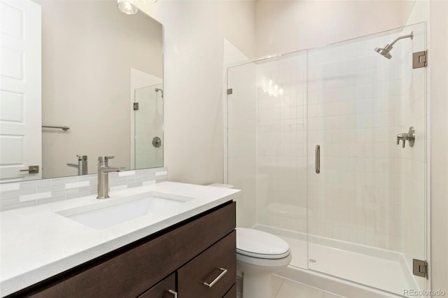 1711 Branching Canopy Dr, Windsor, CO 80550 - full bathroom with vanity, a shower stall, toilet, and tile patterned floors