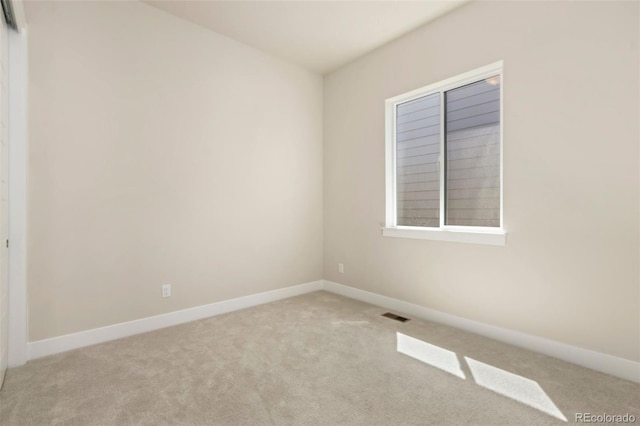 1711 Branching Canopy Dr, Windsor, CO 80550 - carpeted spare room with baseboards