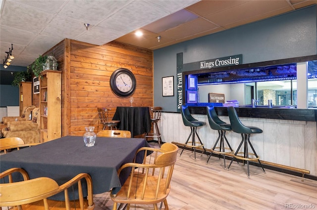 490 Kings Crossing Rd Unit 514, Winter Park, CO 80482 - dining space featuring a community bar, wooden walls, and wood finished floors