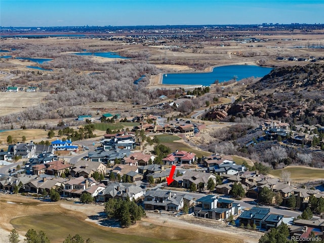 8033 Galileo Way, Littleton, CO 80125 - aerial view of property and surrounding area with a large body of water, a golf club, and nearby suburban area