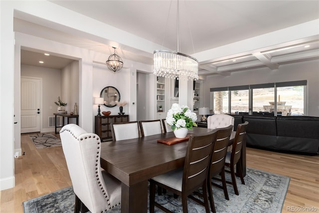 8033 Galileo Way, Littleton, CO 80125 - dining area with a chandelier, light wood-type flooring, recessed lighting, beam ceiling, and coffered ceiling