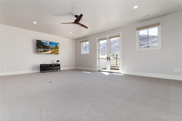 8033 Galileo Way, Littleton, CO 80125 - unfurnished living room featuring ceiling fan, recessed lighting, carpet flooring, and baseboards