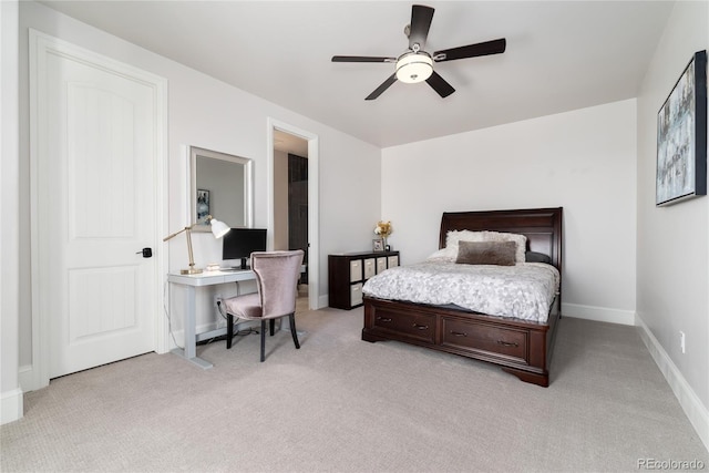 8033 Galileo Way, Littleton, CO 80125 - bedroom with light carpet, baseboards, an office area, and a ceiling fan